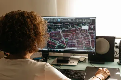 Person looking at a map on a computer